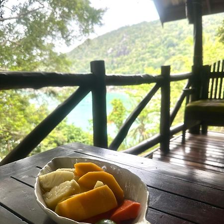 Bambu Huts Hotel บ้านใต้ ภายนอก รูปภาพ
