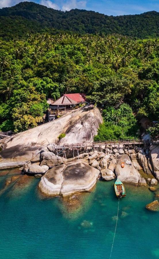 Bambu Huts Hotel บ้านใต้ ภายนอก รูปภาพ
