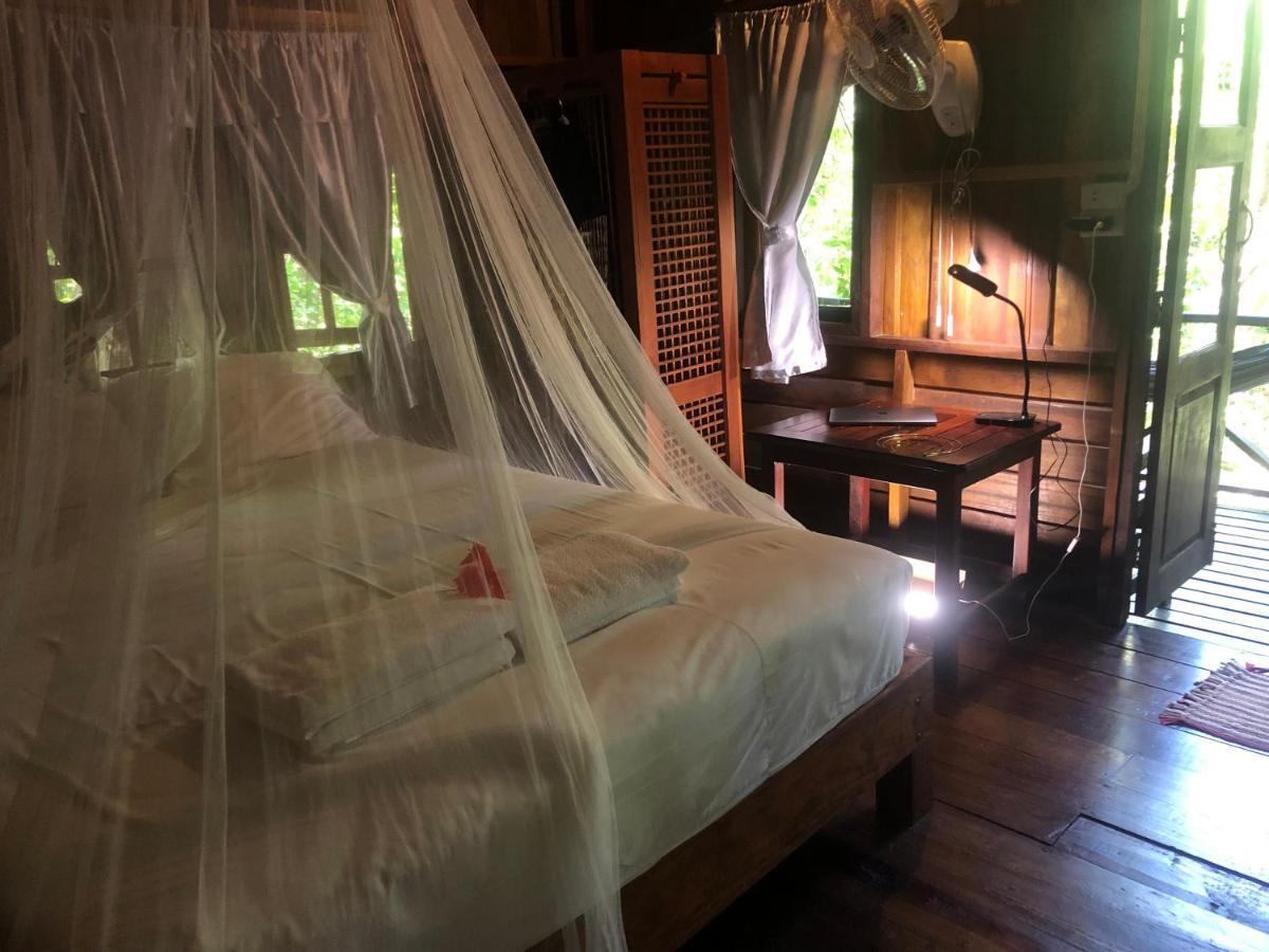 Bambu Huts Hotel บ้านใต้ ภายนอก รูปภาพ